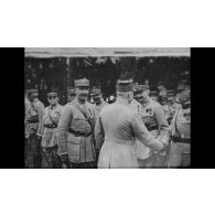 [Le général Pétain reçoit le bâton de maréchal.]