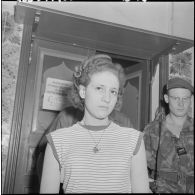 Zohra Drif capturée au côté de son compagnon Yacef Saadi, chef du front de libération national (FLN) de la zone autonome d'Alger.