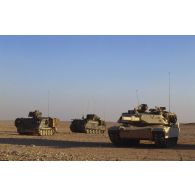 En ZDO (zone de déploiement opérationnel) Olive, un char de combat américain Abrams-M1 et deux blindés M901.