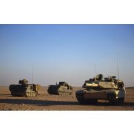 En ZDO (zone de déploiement opérationnel) Olive, un char de combat américain Abrams-M1 et deux blindés M901.