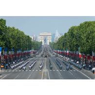Défilé des escadrons de motocyclistes du centre national de formation à la sécurité routière de la Gendarmerie (CNFSR) et de la Police nationale sur les Champs-Elysées, à Paris.