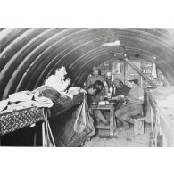 1390. Pont d'Hénaménil. P[oste de] S[ecours de] B[ataillon] Dominique. 16 mars [1918]. [légende d'origine]