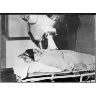 Photographie : une femme passe un examen médical.