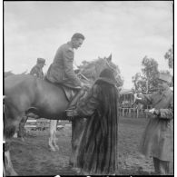 Une compétition hippique. [Description en cours]