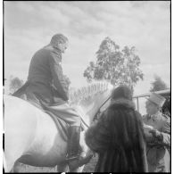 Une compétition hippique. [Description en cours]