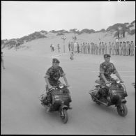 Défilé d'engins motorisés à Sidi-Ferruch devant M. Messmer, le général Ailleret et les officiers du secteur.