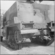Oran. Déblaiement du lycée Ardaillon. Dégâts causés par un attentat au plastic sur un half-track.