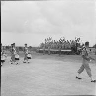 Départ du général Fourquet. Défilé de la musique.