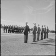 Les autorités assistent au défilé lors de la prise d'armes à l'occasion de la dissolution du Centre d'instruction du service du matériel n° 3 (CISM n°3).