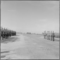 Les autorités assistent au défilé lors de la prise d'armes à l'occasion de la dissolution du Centre d'instruction du service du matériel n° 3 (CISM n°3).