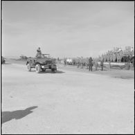 Les autorités assistent au défilé lors de la prise d'armes à l'occasion de la dissolution du Centre d'instruction du service du matériel n° 3 (CISM n°3).