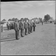 Les autorités assistent au défilé lors de la prise d'armes à l'occasion de la dissolution du Centre d'instruction du service du matériel n° 3 (CISM n°3).