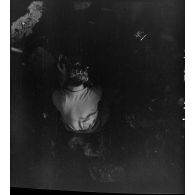 Exhumation de cadavres sur le charnier de Langson.