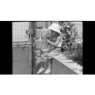 Fonds cinématographique de André Bernard. Film 8 mm intitulé "Une journée de labeur à Brazzaville'.