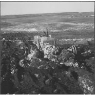 Chantiers de la Défense et Restauration des sols (DRS). Un engin Caterpillar en action.