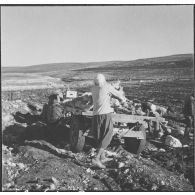 Chantiers de la Défense et Restauration des sols (DRS). Evacuation des pierres avec les divers moyens modernes employés.