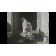 Fonds cinématographique de Pierre Marrel. Film « No 1. Jean-Pierre. Coq. Brigade. Mairie ».