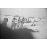 Des mortiers schwere Granatwerfer 34 en position.