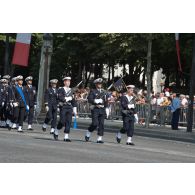 Défilé de l'équipage de la FDA (frégate de défense aérienne) Forbin sur les Champs-Elysées, lors du défilé du 14 juillet 2018 à Paris.