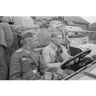 Rencontre entre un équipage de semi-chenillé Sd.Kfz.6/2 équipé d'un canon de 3.7cm Flak 36 du Leichte Flak Abteilung 71 et un Panzer-III de la 5.Panzer-Division.