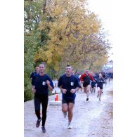 Portrait de coureurs du Running Together, cross organisé pour la seconde fois à Pristina par la KFOR.