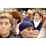 Portrait de fidèles lors de la cérémonie religieuse du PMI (pèlerinage international millitaire) de Letnica.