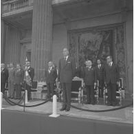Valéry Giscard d’Estaing, président de la République, à la tribune présidentielle devant l'Ecole militaire, lors de la cérémonie du 14 juillet 1977.