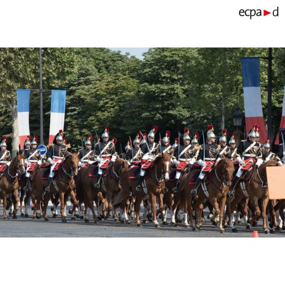 Défilé du régiment de cavalerie de la Garde républicaine sur les Champs-Elysées, lors du 14 juillet 2018 à Paris.