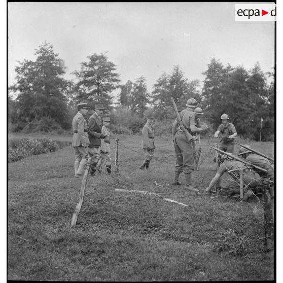 Epreuve d'organisation du terrain du relais d'honneur du 18e RI.