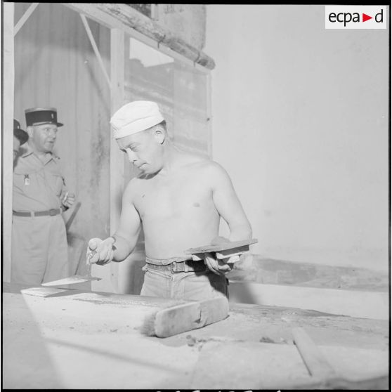 Construction de nouvelles cuisines au poste du 3e REI (régiment étranger d'infanterie) à Arris.