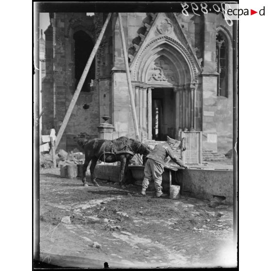 Magnières, l'abreuvoir devant l'église. [légende d'origine]