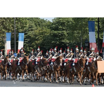 Défilé du régiment de cavalerie de la Garde républicaine sur les Champs-Elysées, lors du 14 juillet 2018 à Paris.