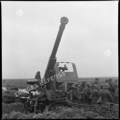 Plan général d'un canon de 75 mm CA M17/34 et de ses servants.