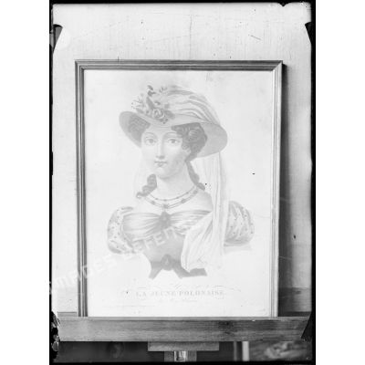 Reproduction d'une gravure représentant une jeune femme.
